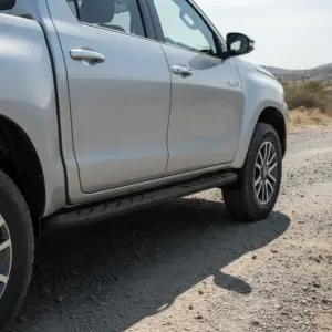 ESTRIBO OFF-ROAD SHARK PARA TOYOTA HILUX REVO 8VA GENERACIÓN 1FL 2016-ON - W562BB