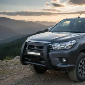 DEFENSA DELANTERA NEGRA CON LUZ PARA TOYOTA HILUX REVO 8VA GENERACIÓN 2016-ON - W56BDM